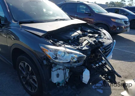 2016 Mazda Cx-5 Grand Touring z USA, uszkodzony, nr VIN JM3KE2DY6G0866163